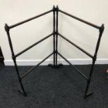 An antique 2 fold clothes horse stand. Measures 90cm in height