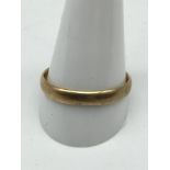 18CT Gold mens large wedding band. Weighs 4.25grams