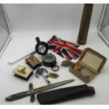 A mixed lot of Military war items to include 1919 brass shell, 1940 MK3, a compass, two matchbox