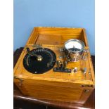 Schall & Son Ltd London medical instrument within a light oak carry case.