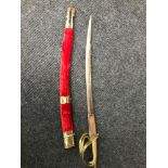 A vintage Indian tulwar curved short sword with scabbard