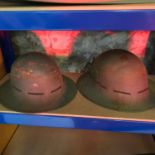 A lot of two WW2 British helmets