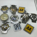 A Collection of Vintage AA, RAC and other car badges.