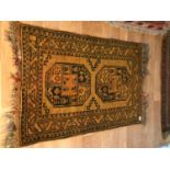 An antique Aztec Peruvian rug, Measures 106x80cm