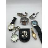 A Lot of various ladies and gents watches which includes a pocket watch.