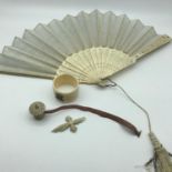 A Lot of 4 carved Victorian and early 1900s ivory items. Includes Pagoda style measuring tape,