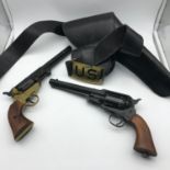 A Lot of two Rreplica BSA 98 & Japan revolver toy guns. Comes with a Holster and US ARMY 7th Cavalry