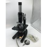 Philip Harris Microscope in a working condition.