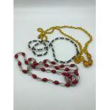 A Lot of 3 vintage 1910/ 20's glass and bead necklaces. Includes Amber graduating glass bead