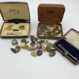 A Lot of vintage cuff links and costume brooch.