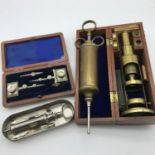 A lot of scientific items to include portable brass microscope with slides