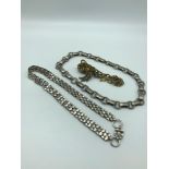Two Silver chunky chains together with gilt metal German made bracelet with large fob set with