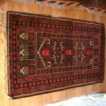 An antique Aztec Peruvian rug, Measures 142x93cm