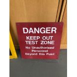 Vintage metal "Danger keep out test zone" sign.