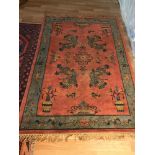 An antique Oriental ornate rug, Measures 240x133cm