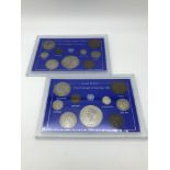 A George V and George VI coin set to include silver coins, within presentation cases