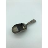 A Georgian silver caddy spoon. Made by Josiah Snatt dated 1802. Measures 9.3cm in length