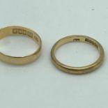 Two 18ct gold wedding bands. Total weight 5.05grams. Both size M 1/2.