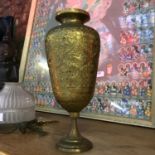 A Persian gilt brass vase