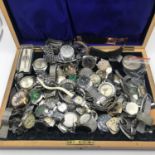 A Box full of vintage watches and spares.