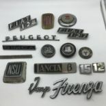 A Lot of vintage car badges includes Fiat, Lancia, Peugeot & Vauxhall.