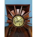 A Retro sunburst clock by Anstey & Wilson England.