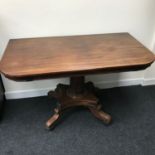 A Victorian D-End window table in mahogany. Supported on a single pedestal and square base on 4 legs