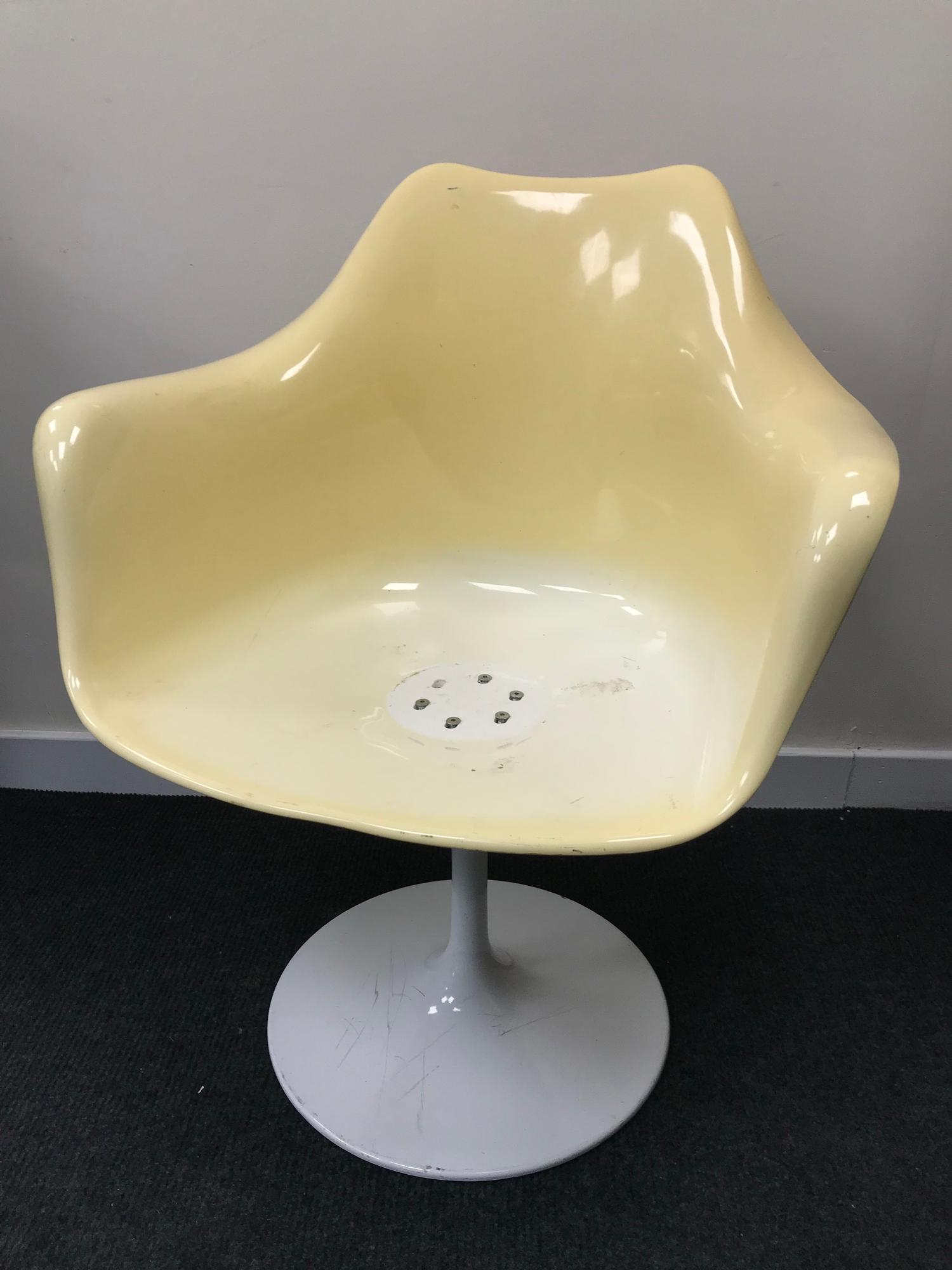 A Retro Tulip design chair made by Rudi