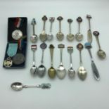 A Collection of Nautical souvenir spoons which includes Birmingham silver and enamel spoon, Together