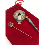 A Lot of 3 Antique silver and gold agate stone brooches and pin. Sword brooch is stamped Sterling to