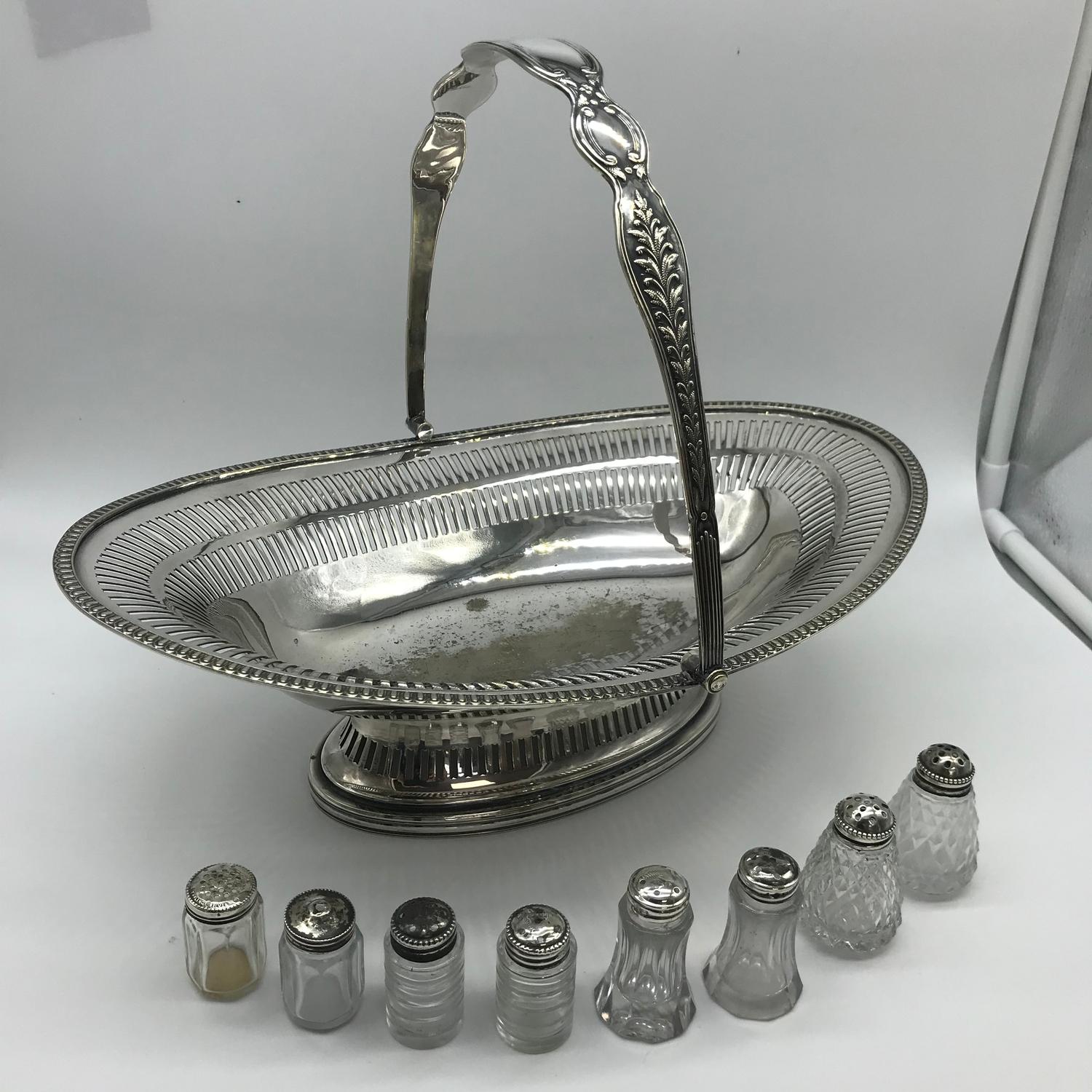 A Welbeck plate swing handle basket together with 4 sets of Sterling silver topped cruets