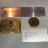 A collection of four Scottish National Party (SNP) original building signs