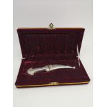 A 900 grade silver ceremonial dagger, within presentation case