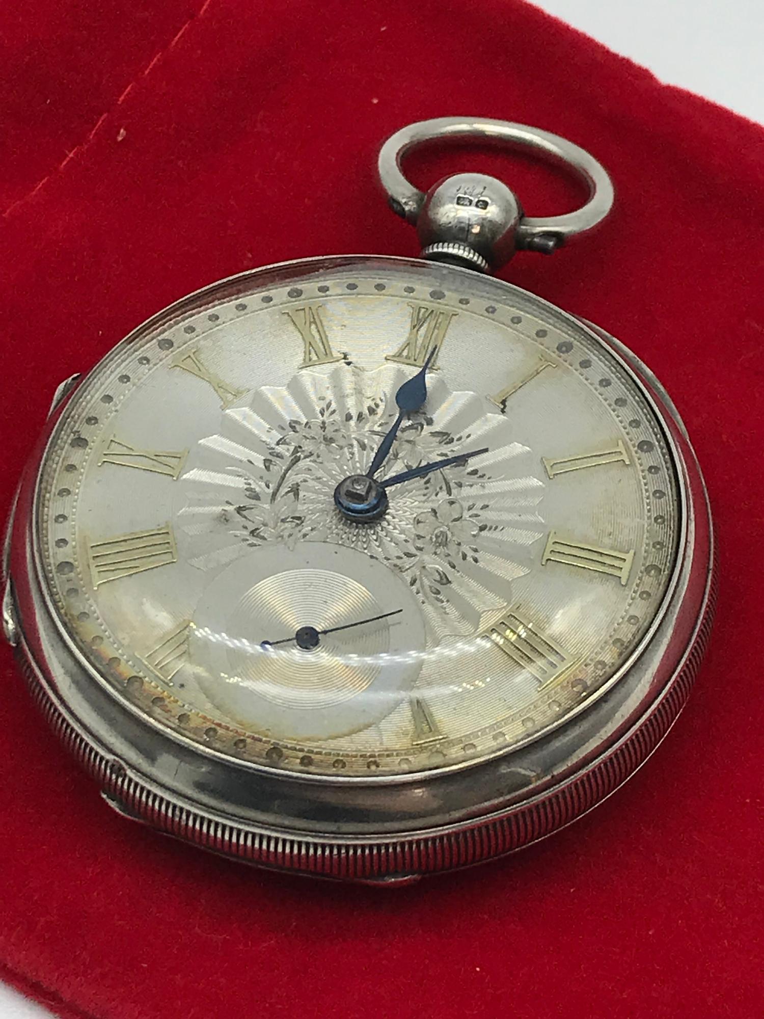 A Chester silver pocket watch, Fusee movement. Comes with key and small chain. Silver maker Jesse