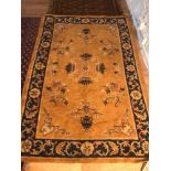 An antique oriental designed rug, Measures 193x129cm