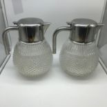 A Pair of Vintage Italian made water jugs by Mepra. Crystal bases. One has an ice container.