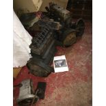 Two vintage 1930s 1100 cc car engines with parts. One possible being reconditioned.