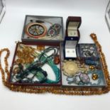 A Collection of vintage jewellery which includes Amber bead necklace, Various glass and bead