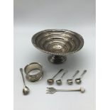 A Sterling silver tazza dish, four Silver hall marked condiment spoons, a Sheffield silver pickle