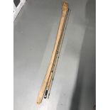 A Two piece split cane rod by Edger Sealey. Comes with bag.