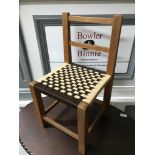 A Childs vintage weaved chair.