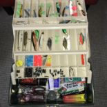 A Plano fishing tackle box filled with various Fresh water tackle.