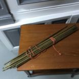 A Collection of antique brass stair rods.