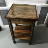 A Rosewood two tier side table. Measures 71x41x41cm