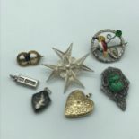 A Mixed lot of Brooches and pendants, Includes 925 silver filigree pendant/brooch, Silver and enamel