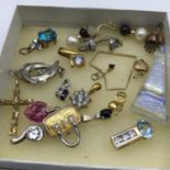 A Lot of Silver and gilt metal pendants and charms