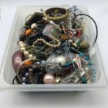 A tub of costume jewellery