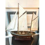 A Large boat model on fitted stand.