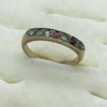 A 9ct gold ladies 7 gem stone ring, set with diamond, sapphire and emerald stones, size N.