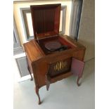 An antique Edison Bell Discophone cabinet. Measures 92x77x50cm